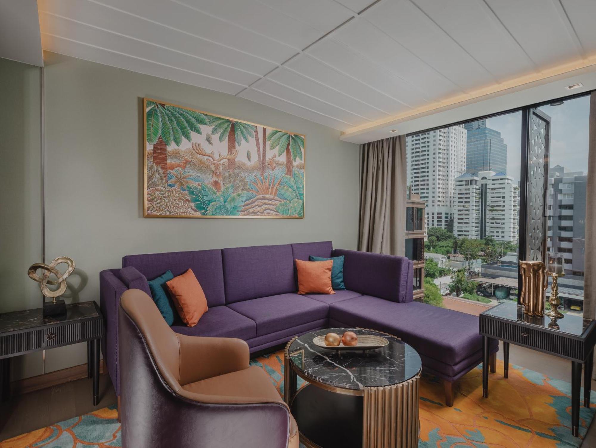 Nysa Hotel Bangkok Sukhumvit 11 المظهر الخارجي الصورة Living room of a suite